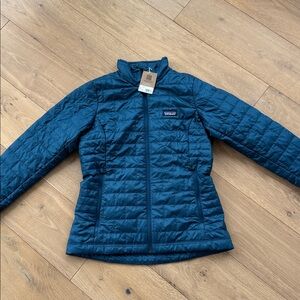 Patagonia women’s nano puff jacket.  Size medium new with tags.